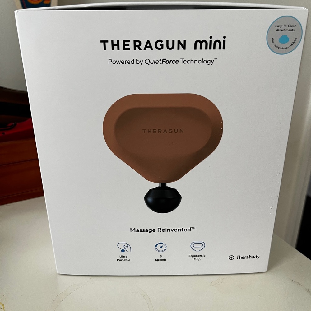 Theragun Mini in Rose. NIB
